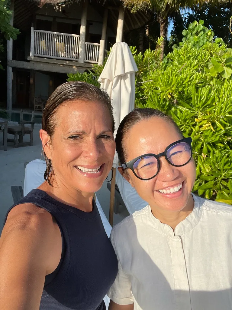 Denise Godreau with a Barefoot Guardian host at Soneva, the Maldives